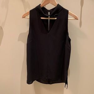 Black sleeveless top with neck detail